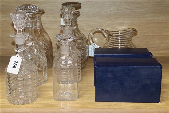 A 19th century cut glass decanter with mushroom stopper, a pair of decanters and stoppers and four other items